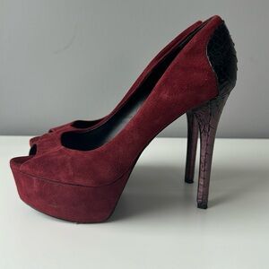 Brian Atwood platform peep toe pumps with snake skin accent on back of heel